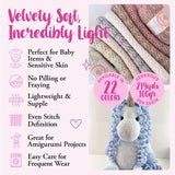 Yarn with crochet unicorn and product details on a white background