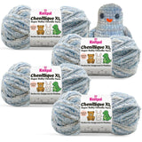 KnitPal Chenillique XL super bulky chenille yarn in Blue Whisper blue and gray colorway, four skeins with crochet bird plushie.