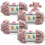 KnitPal Chenillique XL super bulky chenille yarn in Enchanted Berry pink and mauve colorway, four skeins with amigurumi crochet lamb plushie.