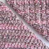 KnitPal Chenillique XL chenille yarn in Enchanted Berry, close-up swatch half knit half crochet showing plush speckled pink-mauve texture.