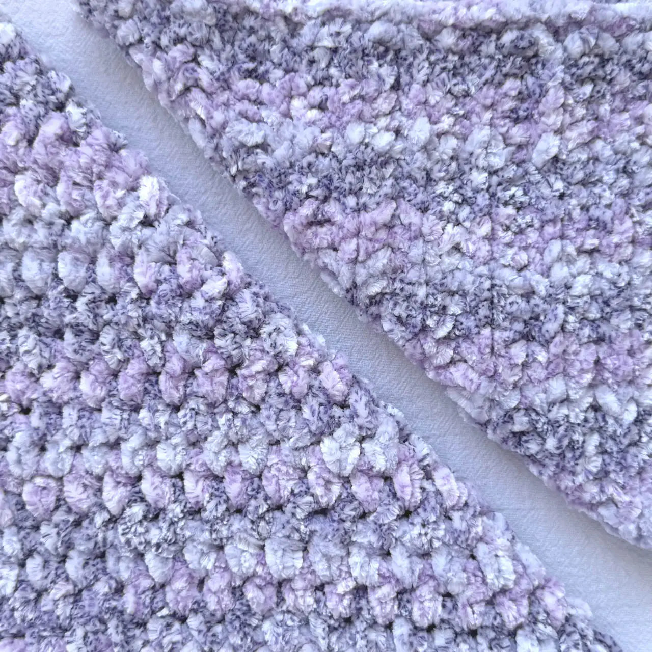 KnitPal Chenillique XL chenille yarn in Lavender Bliss, close-up swatch half knit half crochet showing plush speckled lavender texture.