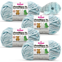 KnitPal Chenillique XL super bulky chenille yarn in Ocean Mist blue and white colorway, four skeins with crochet whale plushie.