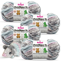 KnitPal Chenillique XL super bulky chenille yarn in Orchid Mist gray, blue, and lilac colorway, four skeins with amigurumi crochet mouse plushie