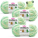 KnitPal Chenillique XL super bulky chenille yarn in Spring Green green, yellow, and cream colorway, four skeins with amigurumi crochet frog plushie.