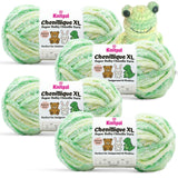 KnitPal Chenillique XL super bulky chenille yarn in Spring Green green, yellow, and cream colorway, four skeins with amigurumi crochet frog plushie.