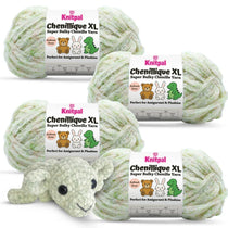 KnitPal Chenillique XL super bulky chenille yarn in Spring Haze cream and green speckled colorway, four skeins with crochet elephant plushie.