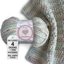 KnitPal Chenillique yarn in Beach Sand colorway, worsted weight 100% polyester chenille cake with label, styled with knitted swatch