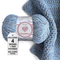 KnitPal Chenillique yarn in Blueberry Whisper colorway, worsted weight 100% polyester chenille cake with label, styled with knitted swatch
