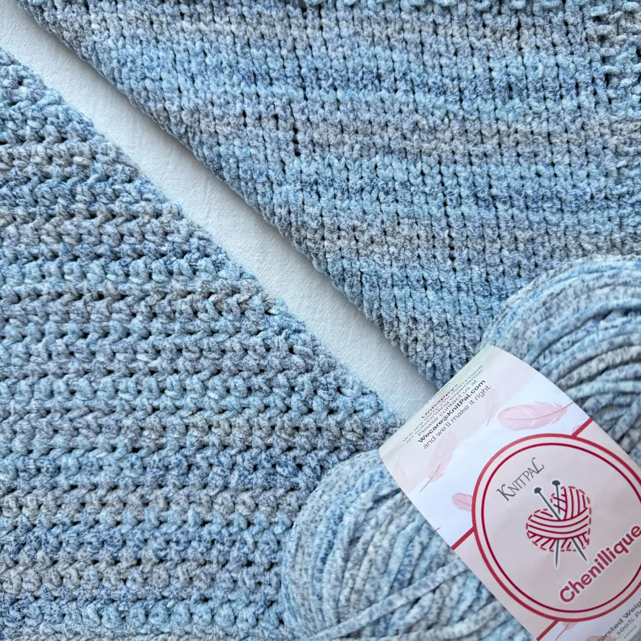 KnitPal Chenillique Blueberry Whisper chenille yarn swatch showing knit and crochet texture side by side in soft heathered blue