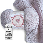 KnitPal Chenillique yarn in Blush Confetti colorway, worsted weight 100% polyester chenille cake with label, styled with knitted swatch
