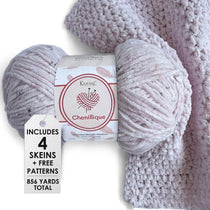 KnitPal Chenillique yarn in Blush Confetti colorway, worsted weight 100% polyester chenille cake with label, styled with knitted swatch