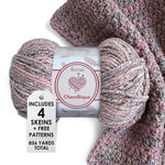 KnitPal Chenillique yarn in Enchanted Berry colorway, worsted weight 100% polyester chenille cake with label, styled with knitted swatch