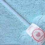 KnitPal Chenillique Icy Mint chenille yarn swatch showing knit and crochet texture side by side in pale mint with soft multicolor flecks
