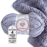 KnitPal Chenillique yarn in Lavender Bliss colorway, worsted weight 100% polyester chenille cake with label, styled with knitted swatch
