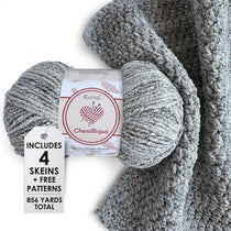 KnitPal Chenillique yarn in Ocean Mist colorway, worsted weight 100% polyester chenille cake with label, styled with knitted swatch