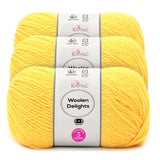 Three skeins of Knitpal Woolen Delights yarn in a bright yellow color, stacked vertically with white paper labels showing product details.
