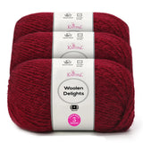 Three skeins of Knitpal Woolen Delights yarn in a rich burgundy red color, bundled together with a white paper label showing product details.