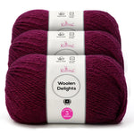 Three skeins of Knitpal Woolen Delights yarn in a deep magenta-purple color, stacked together with white paper labels showing product details.
