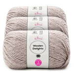 Three skeins of Knitpal Woolen Delights yarn stacked vertically, showing the light heathered taupe color and white paper labels with pink and gray branding.